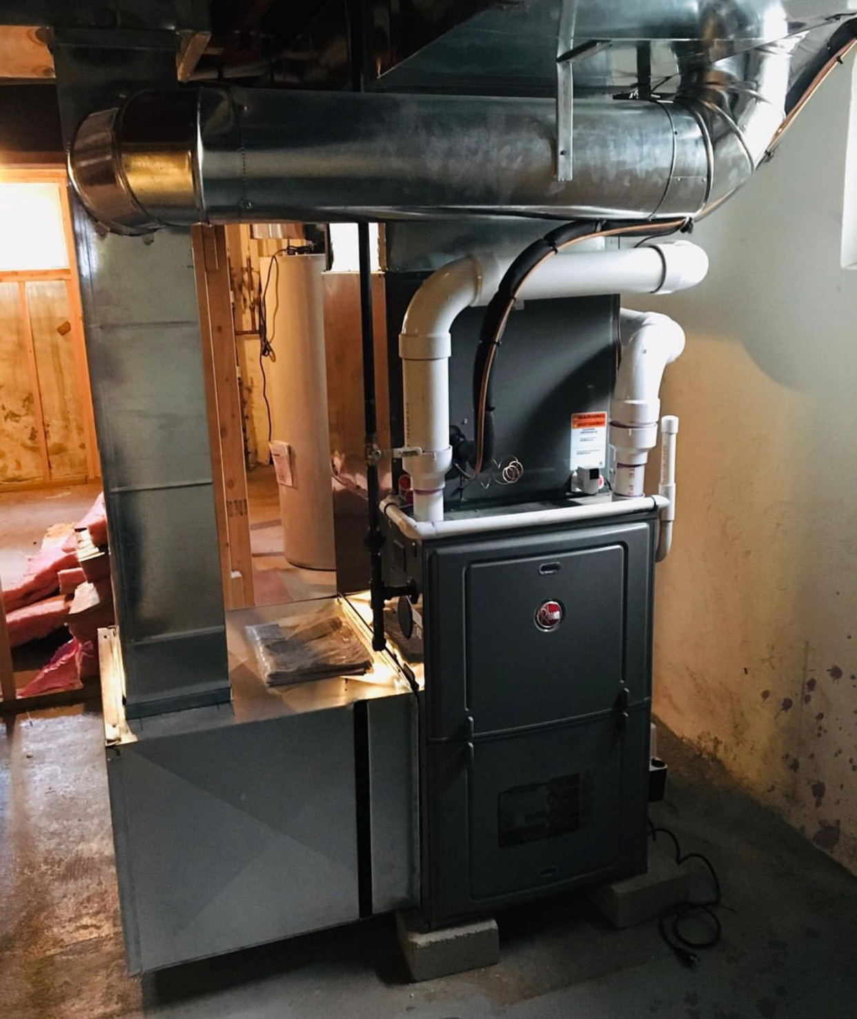 Furnace Repair — Basement Rheem furnace service